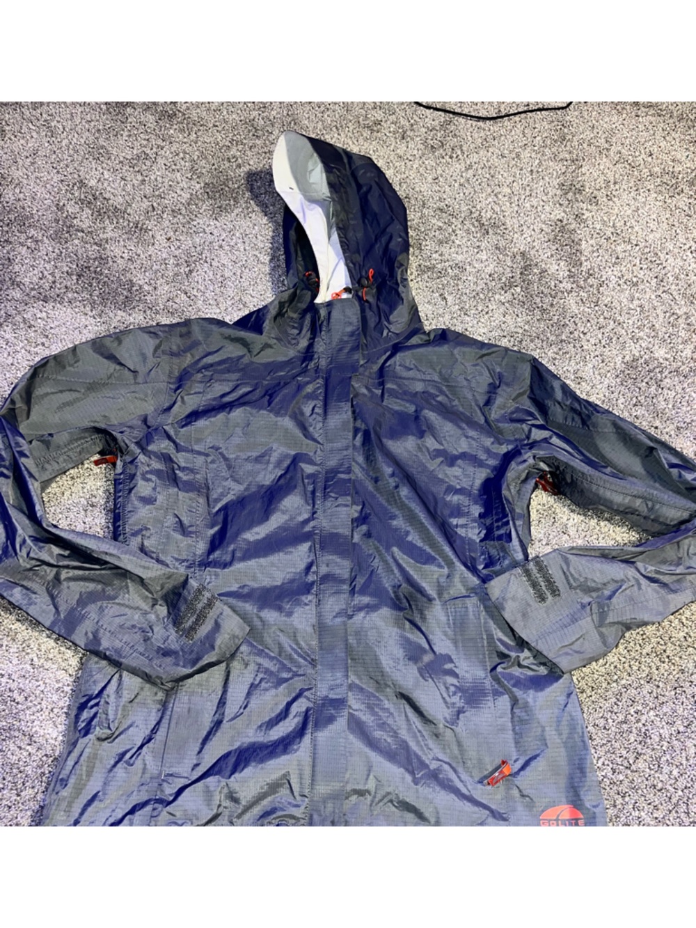 Medium women’s go-lite gray rain coat euc
